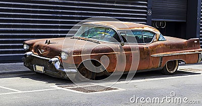 Shot of abandoned, rusty, vintage car. Vintage Editorial Stock Photo