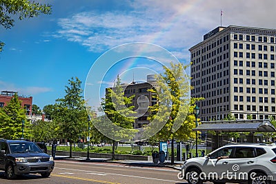 A shot along Market Street with office buildings, The Volunteer State Life Building, Miller park, cars and trucks driving Editorial Stock Photo