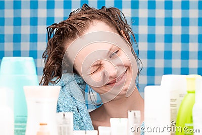 Shot of awakened girl after washing without makeup and hairstyle Stock Photo
