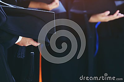 Shot of backside young male graduation hats during commencement success Stock Photo