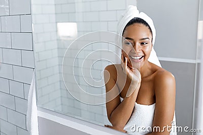 Shot of a beautiful young woman with a towel Stock Photo