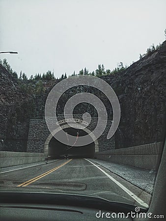 Shot from the car on the tunel in mountain Stock Photo