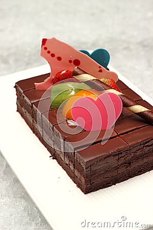 Shot chocolate cake topped with fresh fruit Stock Photo