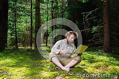 Shot of confused and surprised Caucasian bearded hipster sitting Stock Photo