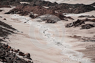 Shot of cracked ice on top of snowy mountain Stock Photo