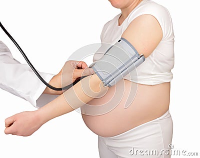 Doctor checking the blood pressure a pregnant woma Stock Photo