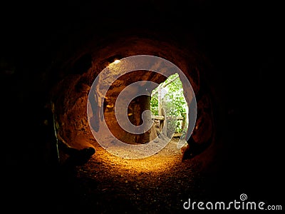 Shot of the exit of a dark cave Stock Photo