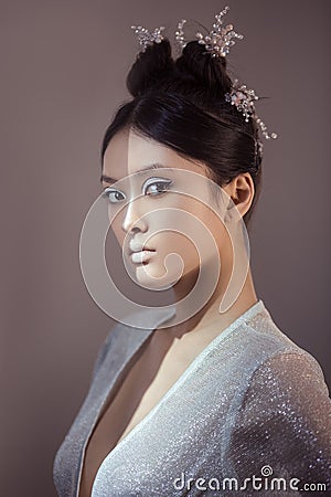 Shot of a futuristic young asian woman. Stock Photo