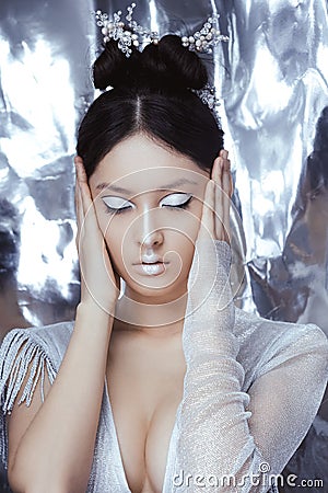 Shot of a futuristic young asian woman. Stock Photo