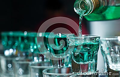 Shot glasses full of alcohol Stock Photo