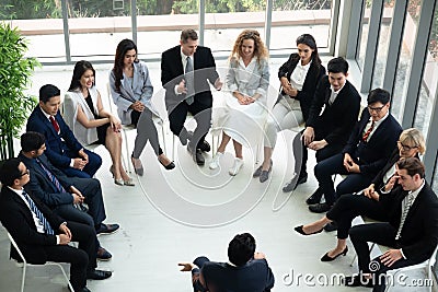 Shot of a group of businesspeople having a discussion in seminar at office Stock Photo