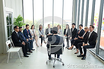 Shot of a group of businesspeople having a discussion in seminar at office Stock Photo