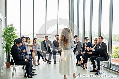 Shot of a group of businesspeople having a discussion in seminar at office Stock Photo