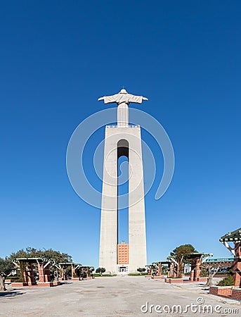 Shot of the iconic Cristo Rei statue in Lisbon, Portugal with a blue sky in the background Editorial Stock Photo