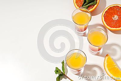 Shot with orange taste, tasty citrus shot concept Stock Photo