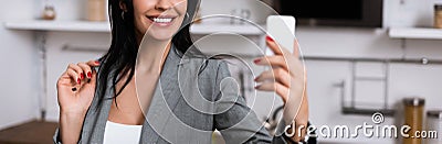 Panoramic shot of smiling businesswoman with Stock Photo