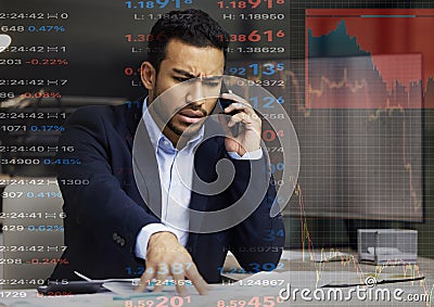 I need you to call me immediately. Shot of a young male stock broker making a frustrated phone call from his office. Stock Photo