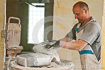 Shotcrete mixer worker Stock Photo