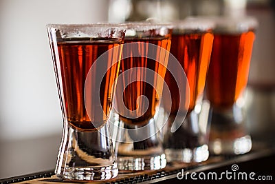 Shots with liquor and salt in cocktail club Stock Photo