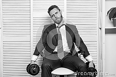 Should work for success. challenging himself. businessman hold dumbbell. sport and business. being best. overworker boss Stock Photo