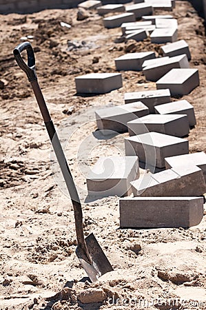 Shovel and bricks Stock Photo