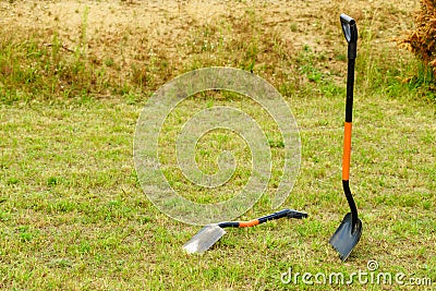 Shovel spade standing outside. Stock Photo