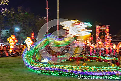 The show dragon lighting move slow shutter for blur lighting ,show in public park Editorial Stock Photo