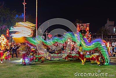 The show dragon lighting move slow shutter for blur lighting ,show in public park Editorial Stock Photo