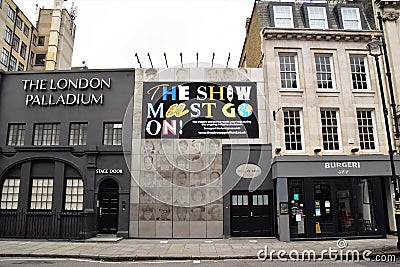 `The Show Must Go On` sign at Palladium Theatre, London Editorial Stock Photo
