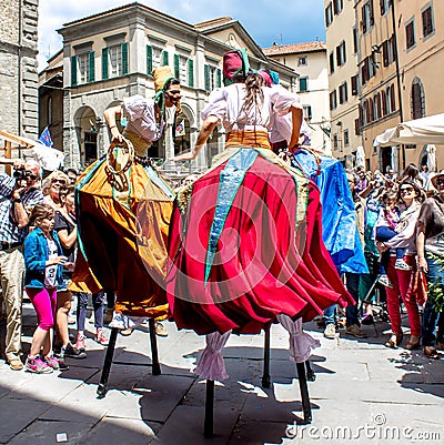 Show of stilt walkers in the street Editorial Stock Photo