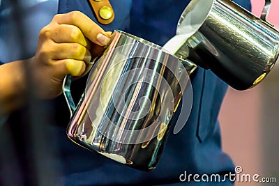 Showcase Barista making Latte art coffee Stock Photo