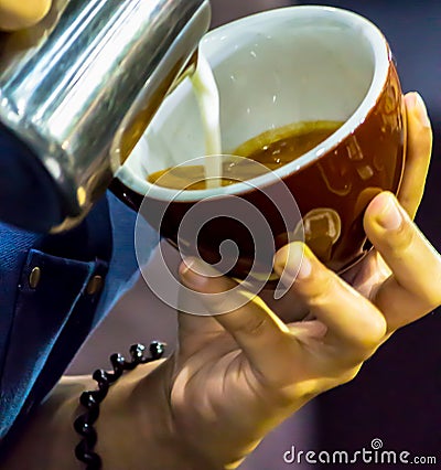 Showcase Barista making Latte art coffee Stock Photo