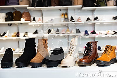 Showcase with casual stylish shoes Stock Photo