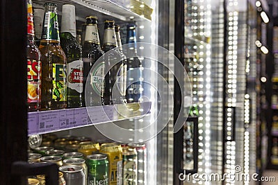 Showcase with chilled beer in the store. Close-up. Moscow, Russia, 12-24-2020 Editorial Stock Photo