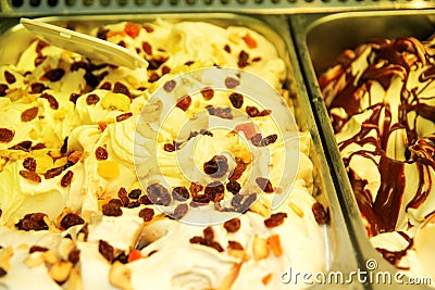 Showcase with colorful fruit ice cream. Ice cream serving counter with many scoop able flavors. Stock Photo