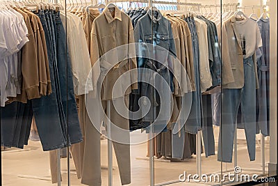 Showcase with female clothes in clothing store, nobody. Stock Photo