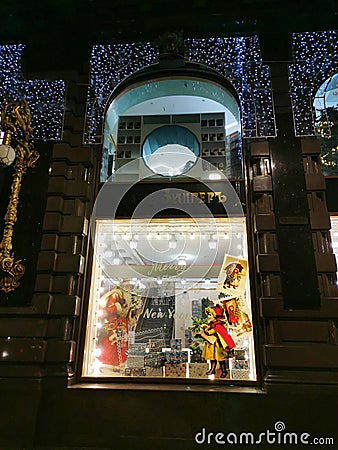 Showcase of the House of Books decorated with fairy-tale characters from Soviet postcards for Christmas and New Year Editorial Stock Photo