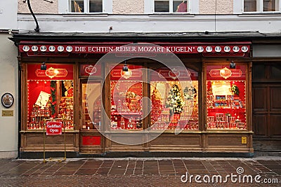 Showcase of Mozartkugeln candy shop in Salzburg, Austria. Editorial Stock Photo