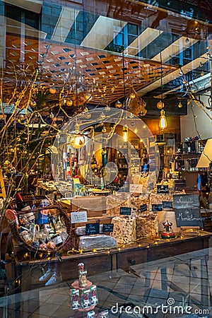 Showcase shop with typical products in Bordeaux, France Editorial Stock Photo