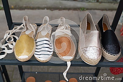 Showcase with summer shoes in south west french store Stock Photo