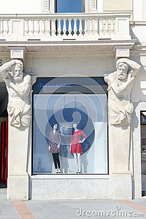 Showcases of Dior fashion clothes store at Lugano on Switzerland Editorial Stock Photo