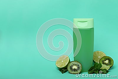 Shower gel and ingredients on mint background Stock Photo