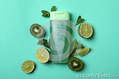 Shower gel and ingredients on mint background Stock Photo