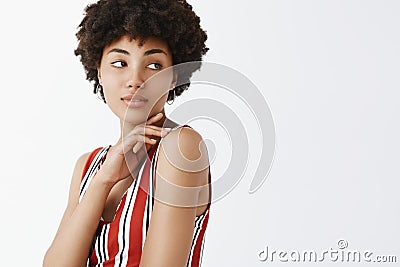 Showing her tender and soft side. Portrait of sensual good-looking mature african american female with afro hairstyle Stock Photo