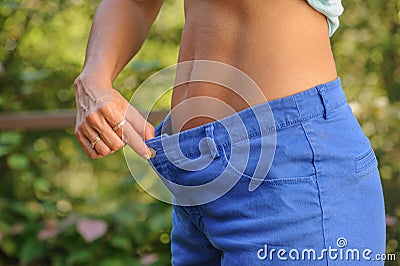 Showing weight loss Stock Photo