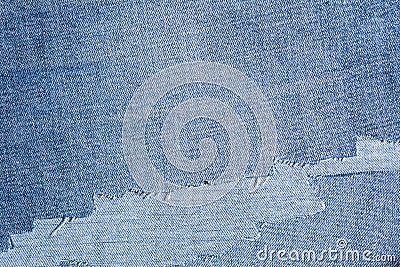 Shreds of denim fabric, unevenly cut jeans Stock Photo