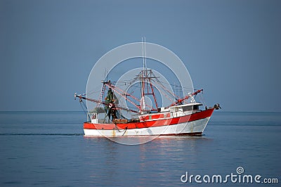 Shrimp boat at sea Stock Photo