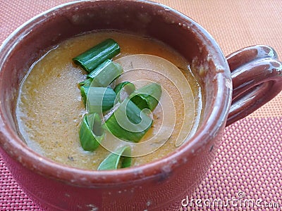 Shrimp broth in a clay cup Stock Photo