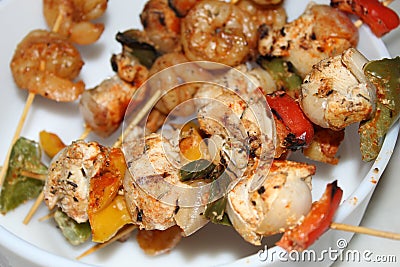 Shrimp and chicken skewer or mix kebab close and cropped view. Stock Photo