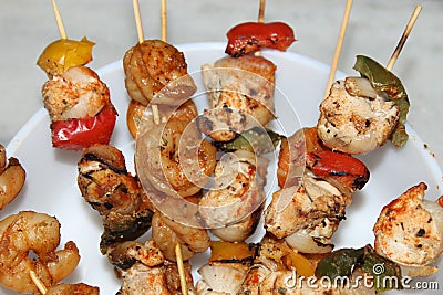 Shrimp and chicken skewer or mix kebab close and cropped view. Stock Photo